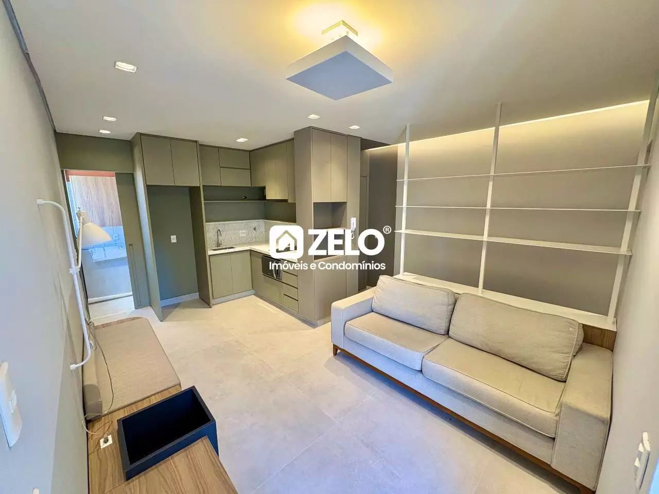 Sala de apartamento bem iluminada